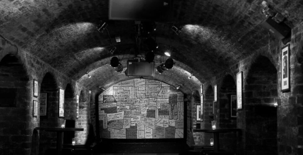 project banner cavern club